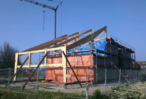 Duurzame woning met kasconstructie