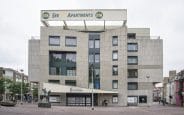 Infraroodpanelen verwarmen woningen in voormalig bankgebouw